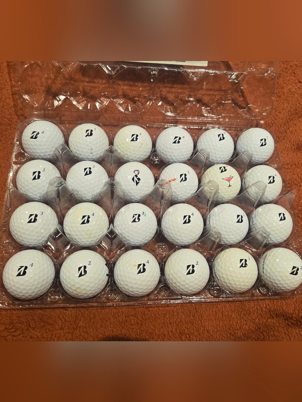 24 Bridgestone White Golf Balls. Tour BX, B RX, B RXS, and B XS. VG condition!